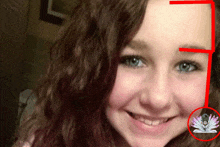 a close up of a girl 's face with a red arrow pointing to the left