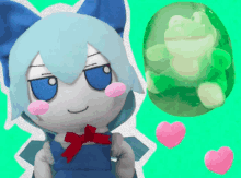 a stuffed animal with blue hair and a red bow stands next to a green frog