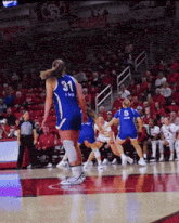 a female basketball player with the number 31 on her shirt