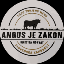 a logo for angus je zakon with a cow in the grass