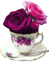 a cup with purple and pink roses on it