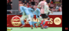 a blurred image of a soccer game with # 20 on the bottom left