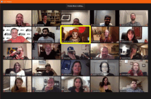a group of people are on a zoom meeting and one of them is wearing a drag queen outfit
