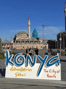 a sign that says konya the city of hearts