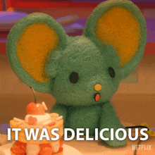 a stuffed animal that says it was delicious on the bottom