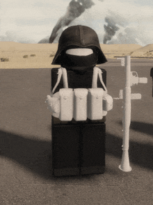 a lego figure wearing a black helmet and a white vest