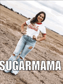 a woman wearing a t-shirt that says sugarmama on it