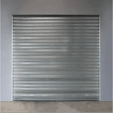 a metal roller shutter is closed on a building .