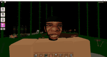 a screenshot of a video game with a man 's head on a box