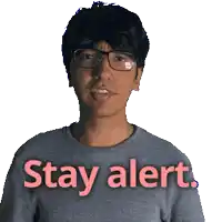 a man wearing glasses says stay alert