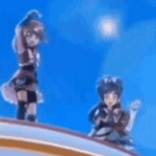 a couple of anime characters are standing on top of a rainbow .