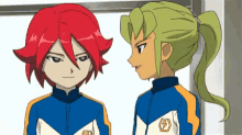 a boy with red hair and a boy with green hair are standing next to each other with the letter b on their jackets