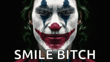 a poster of a clown with the words smile bitch written below it