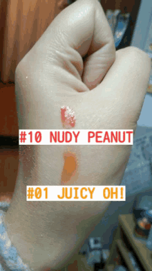 a close up of a person 's hand with # 10 nudy peanut and # 01 juicy oh written on it