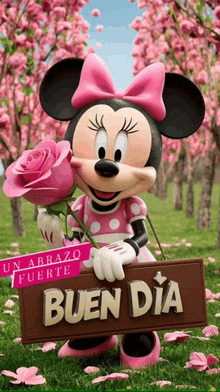 mickey mouse is holding a pink rose and a sign that says bueno