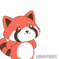 a red panda is holding a ring with a diamond in it