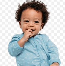 a baby with curly hair is wearing a blue shirt and smiling .