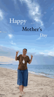 a woman on a beach with the words happy mother 's day