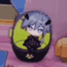 a cartoon character is sitting inside of a green container on a bed .