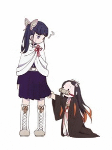 a girl is standing next to a little girl who is kneeling down and drinking from a tube .