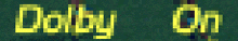 a blurred image of the word dolby on on a green background