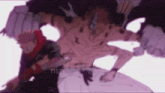 a blurry picture of a man holding a chainsaw fighting a monster .