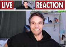 a man is making a funny face in front of a sign that says live reaction