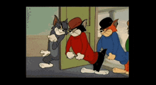 a cartoon of tom and jerry standing next to each other in front of a door .