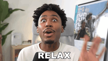 a man with a surprised look on his face has the word relax on his shirt