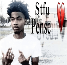 a young man giving the middle finger with the words stfu pense written above him