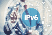 a man in a suit is pointing at a screen with ipv6 written on it