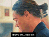 a man with a ponytail says " i love em ... i love em "