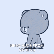 two teddy bears are kissing each other on the cheek while sitting next to each other .