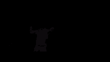 a person standing on top of a rocky hill with their head in the air