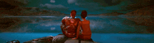 a man and a woman are standing next to each other in a video game