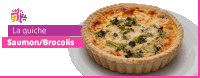 a quiche with broccoli and cheese on a plate