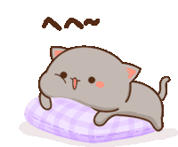 a cartoon cat is laying on a purple pillow with a smiley face