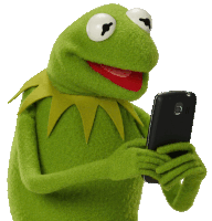 kermit the frog is holding a black cell phone in his hands