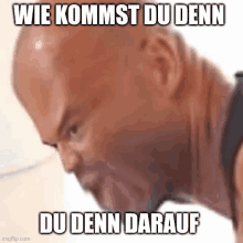 a bald man is making a funny face with the words `` wie kommst du denn du dann darauf '' written on it .