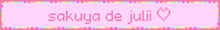 a pink sign that says sakura de julii with a heart