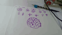 a drawing of a wreath with snowflakes and a bow