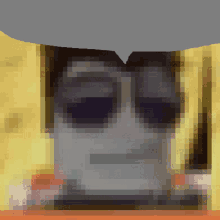 a pixelated image of a person with sunglasses on