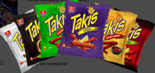 a bunch of bags of takis are lined up