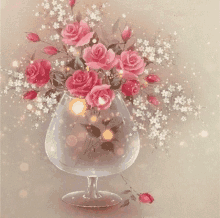 a vase filled with pink roses and baby 's breath on a table .