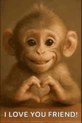 a baby monkey is making a heart with its hands .
