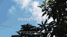 a poster for tribes of asap paint the sky with a tree in the foreground