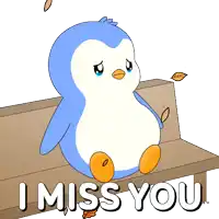 a penguin sits on a bench with the words i miss you