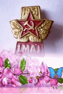 a picture of flowers and a badge that says 1 may