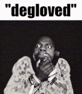 a black and white photo of a man wearing headphones with the words " degloved " above him .