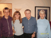 a group of people posing for a picture with the date 2013/11/18 on the bottom